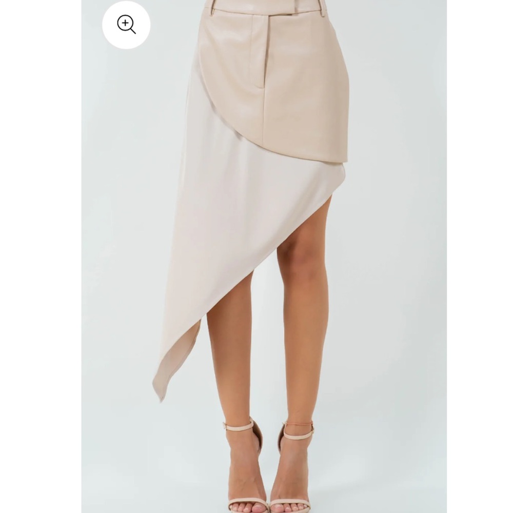 Asymmetrical Cream Skirt. NWT. All sizes.